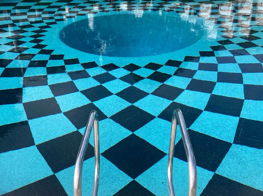 swimming pool with a diamond pattern tile