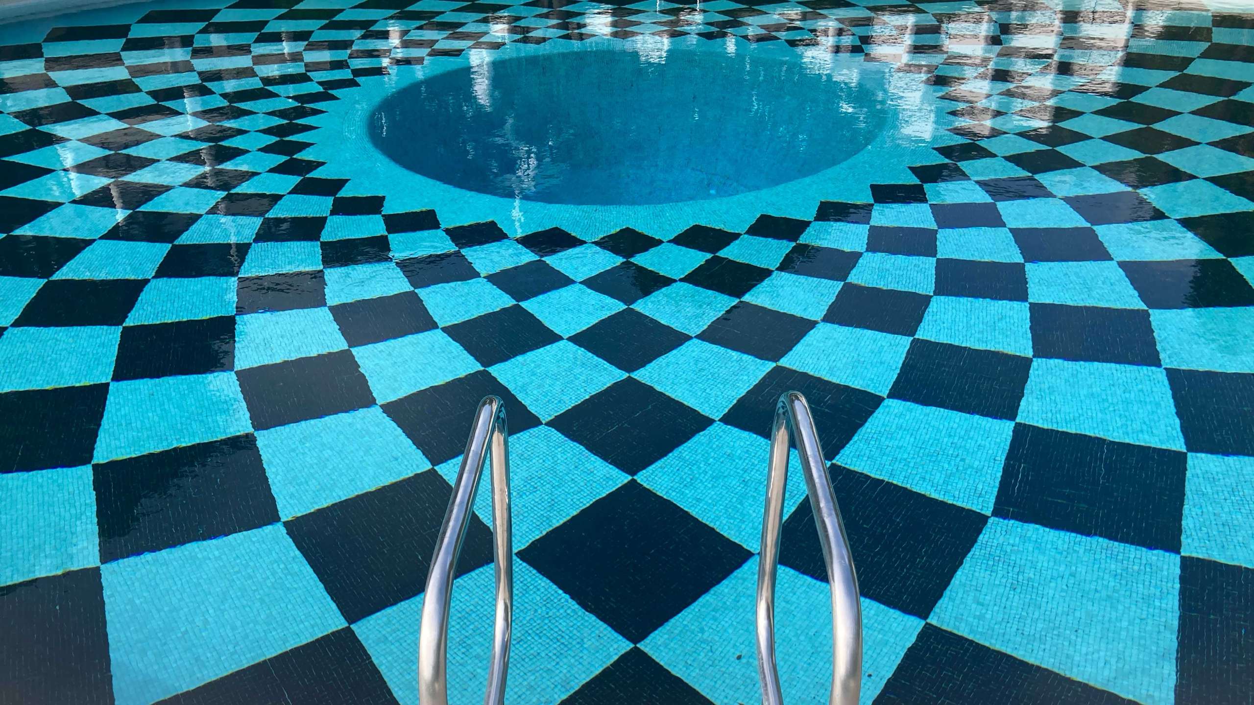 swimming pool with a diamond pattern tile