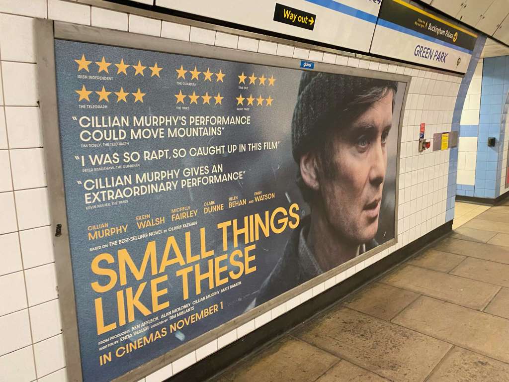 A poster form the film Small Things Like These on Green Park Underground station platform.